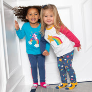 Girl in rainbow pony t-shirt