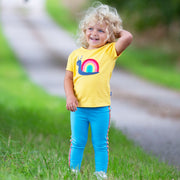 Girl in rainbow snail t-shirt