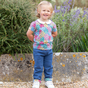 Girl in ladybird joggers