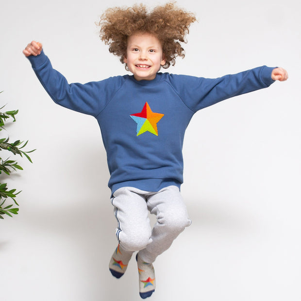 Boy in super star sweatshirt