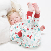 Baby in rocking horse pyjamas