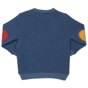 Boy in quilted star sweatshirt