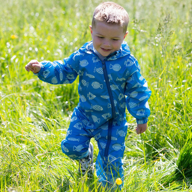 Boy in puddlepack suit