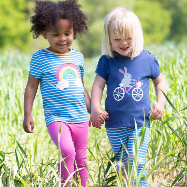 Girl in rainbow t-shirt